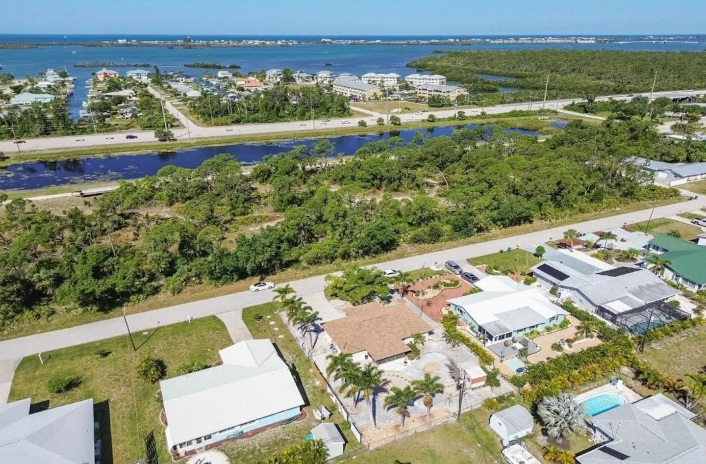 Aerial view of the Grove City neighborhood with Lemon Bay in the distance